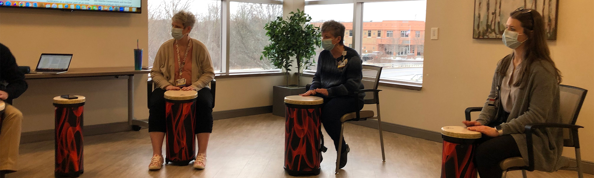 Group of women playing drums