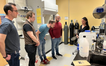 Trainees visiting a research lab