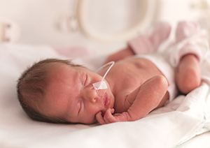 Baby laying in the NICU