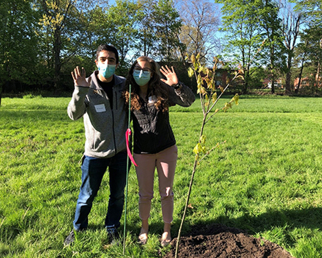 Tree planting at UR President Mangelsdorf home