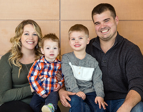 Carter with his parents, Savannah and Chad, and brother Austin.