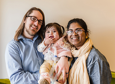 Eliyah with parents Kurtis Perry and Jeshurun Periannan