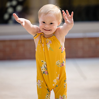 Jorie with arms outstretched