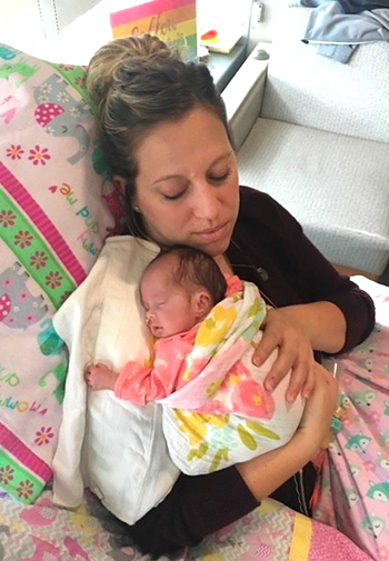 Katrina Wahl in chair with baby