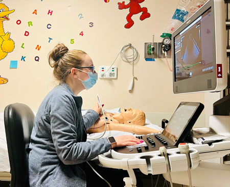 Technician performing an ECHO