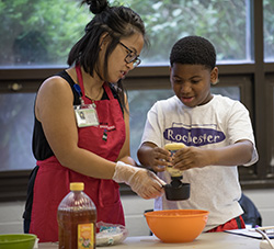 Woman cooking with child