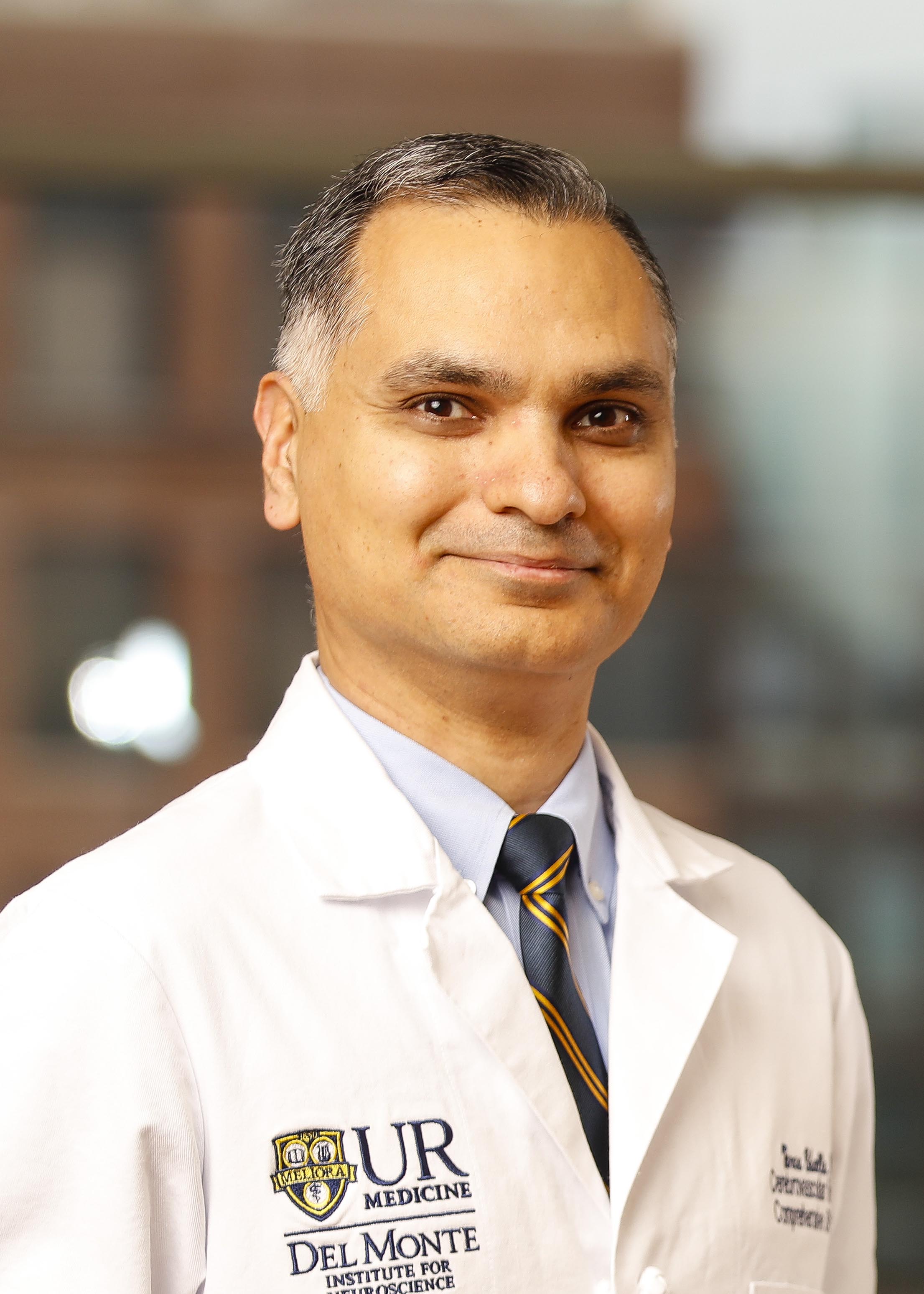 person standing in white coat