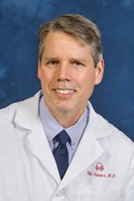 Mark E. Hamer, M.D.