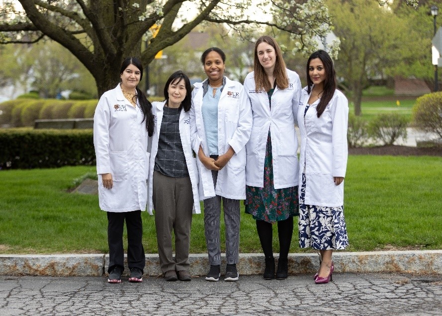 Fellows standing outside