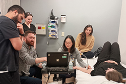 Residents Performing a Practice Ultrasound