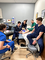 Residents Examining a Foot