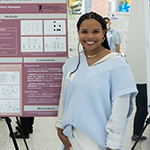 Alivya Barry,  with poster