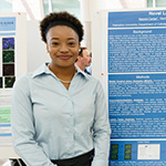 Sebrena M. Brink with poster