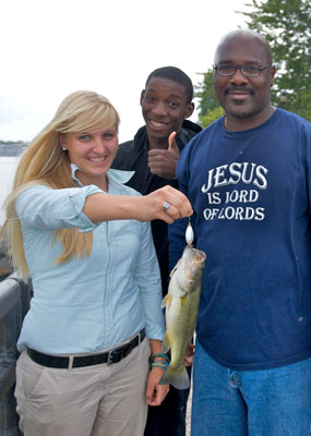 Intern holding bass