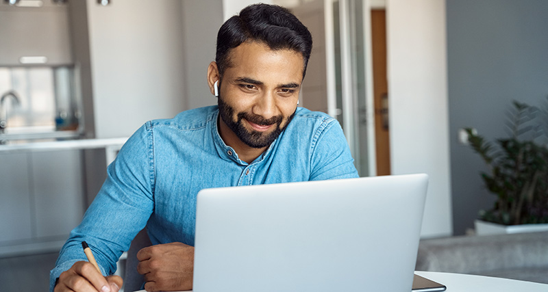 man looking at a computer