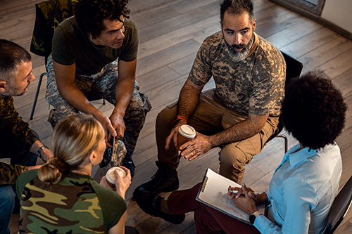 group of veterans talking in a circle