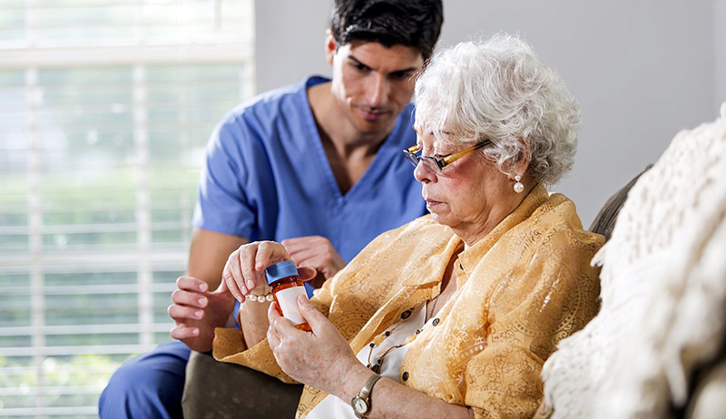 Physician with elderly woman