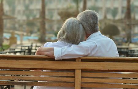 Couple sitting on bench