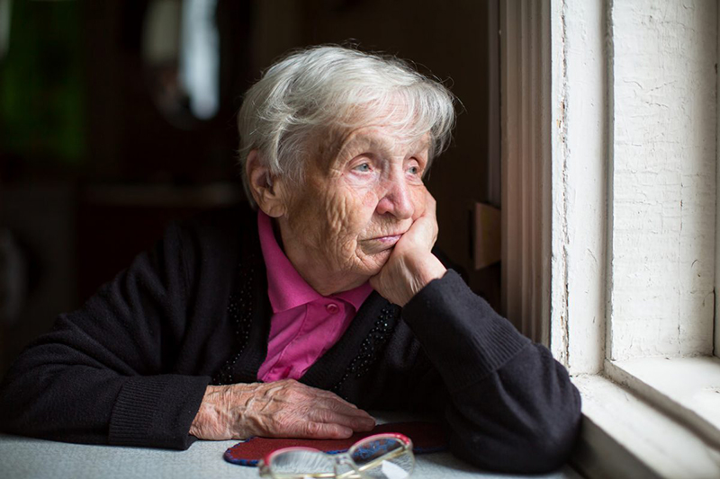 Elderly woman thinking