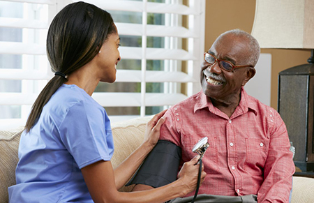 Nurse taking blood pressure