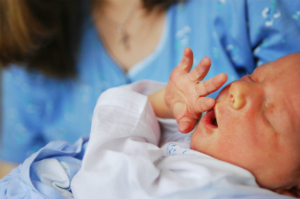 new baby being held by mom