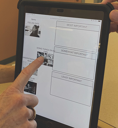 close up of a person touching an ipad