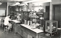 Researcher in the lab, 1930's.