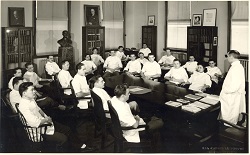 Bibby in the midst of a class lecture to dental interns.