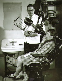 Young patient receiving a dental X-ray, 1917.