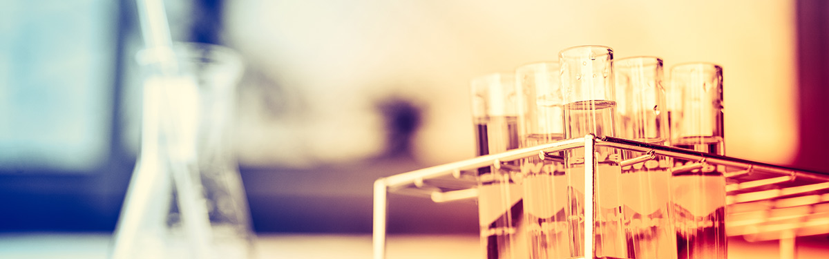 Lab bench with flask and test tubes