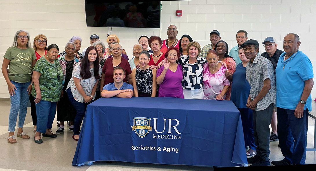 Division chief Annette Medina-Walpole, MD, (just right of center) at a Centro de Oro community event. 