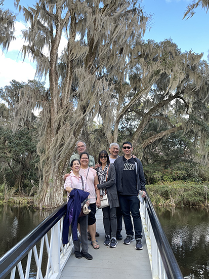 TramAnh Phan, MD (second in from the right) with her family