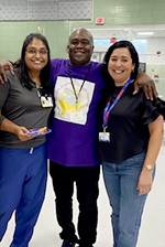 Chandra D'Souza and Ida Earner pictured with Clay Harris, founder of "uniting and Healing through Hope of Monroe County"