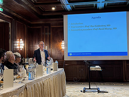 Ilan Goldenberg, MD, presents at a steering committee meeting at EHRA 2025
