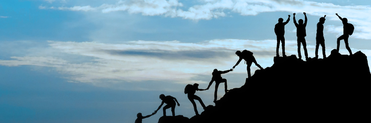 Climbers reach top of mountain together