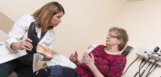 nurse examining patient