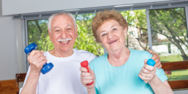 Older man and woman working out