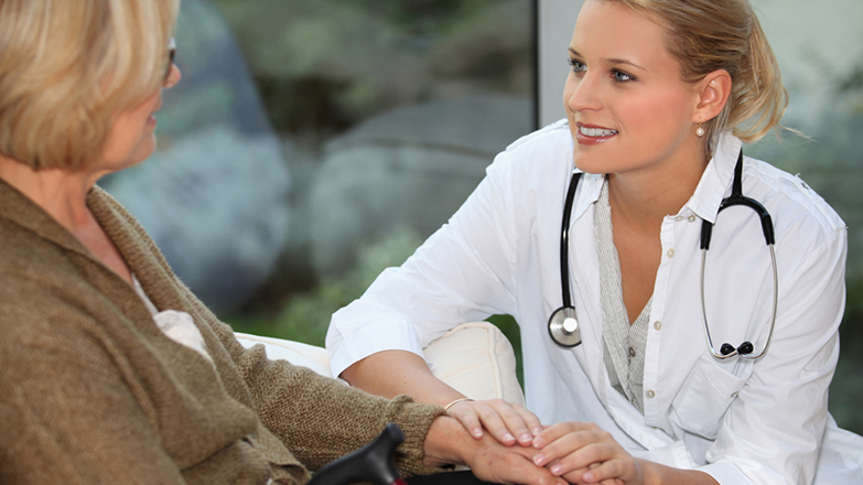 Older woman with doctor talking