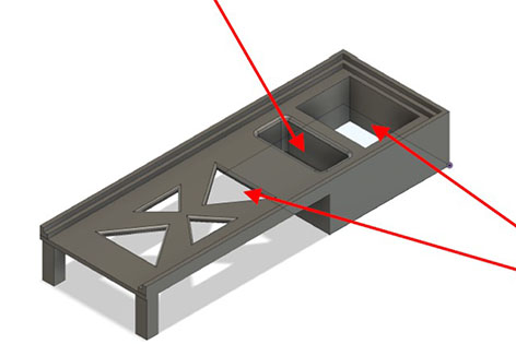 Black prototype device with red arrows