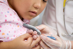 Child Testing Sugar Levels