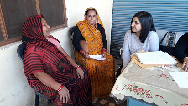 Dr Shalini Vaid talking to people in India