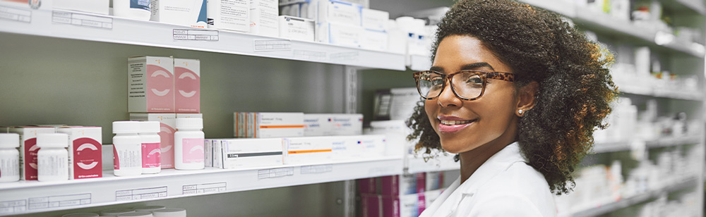 Pharmacy tech smiling at the camera