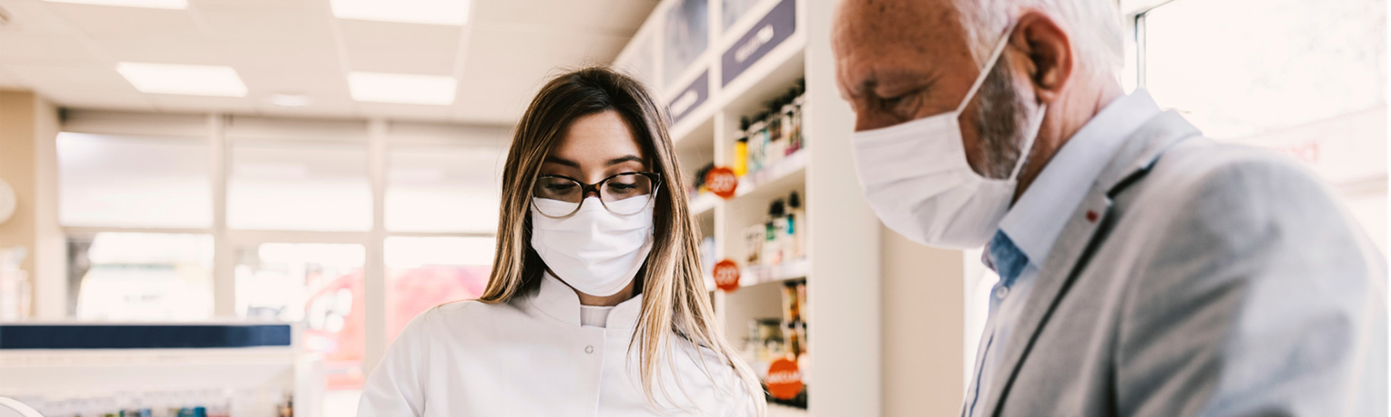 Pharmacist with a patient