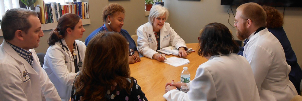 group of faculty talking