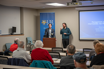 Provider Presenting at a Patient Education Seminar
