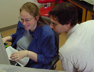 Paul and Kathleen working in the Palis lab.