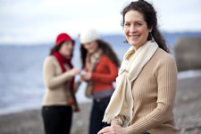 Mother standing with daughters