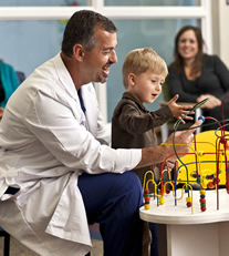 Dr. Walter Pegoli and patient Mason Mitchell