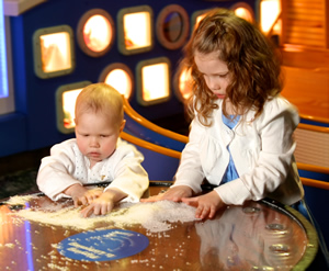 Hailey playing at Strong National Museaum of Play.