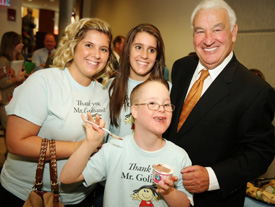 Mr. Golisano with the Noyes family